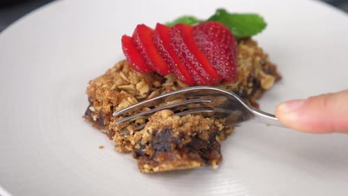 Dessert Being Cut with a Fork Close Up