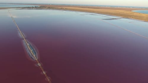 Aerial Shot of a Smooth Sea Area with Straight Fence Stripes in Black Sea in Summer