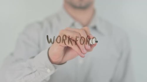 Hand Writes Workforce on Clear Surface