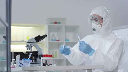 Scientist Preparing Injection in Modern Laboratory