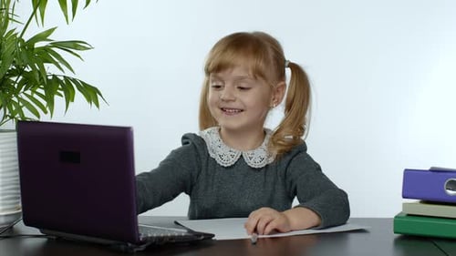 Young Girl On Video Call At Desk