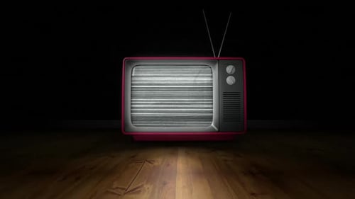 Zoom in animation of old TV turning on and no signal in dark room