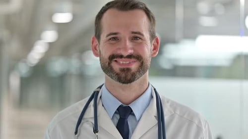 Smiling Doctor Portrait in Modern Clinic Setting