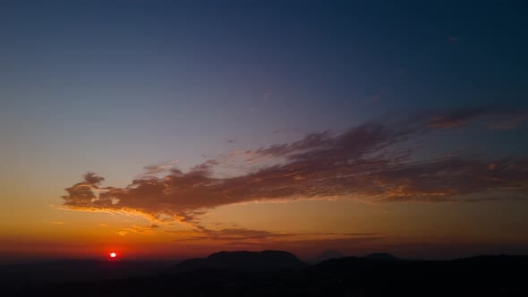 Vibrant Sunrise Over Mountains with Cloudscape, Time Lapse Stock ...