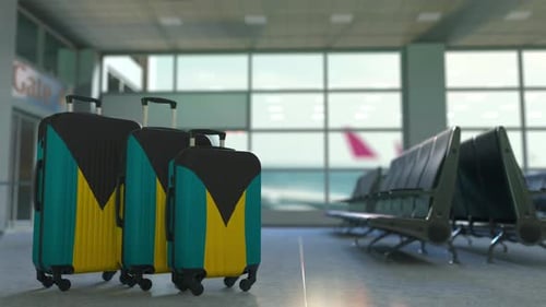 Bahamas Flag Suitcases in Airport Waiting Area