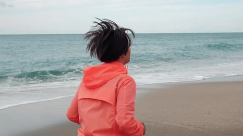 Woman running on the beach