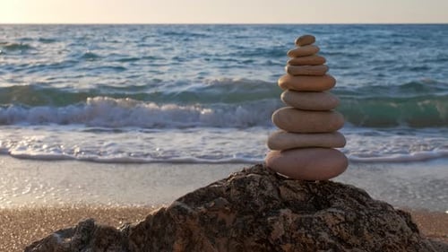 Concept of Balance and Harmony - Stone Stacks on the Beach