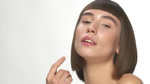 Confident Woman Posing with Stylish Bob Hairstyle