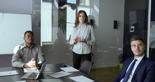 Caucasian Woman Businesslady Boss Leader Financier Makes Report Conducts Conference Seminar for Two