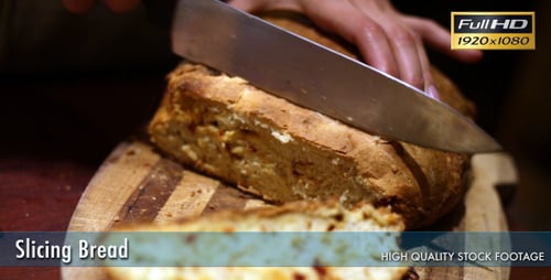 Loaf of Bread Being Sliced on Board