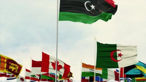Libya Flag Waving with International Flags Background