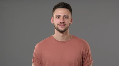Smiling Young Adult Man in T-Shirt