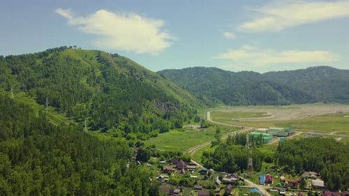 Aerial: Flying Over the Tourist Town, in the Area of the Ancient Mountains