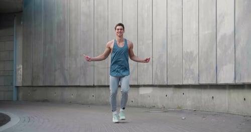 Man Jumping Rope in Urban Environment