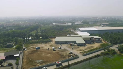 Aerial view of dry ground rough cracks in the land with sand in factory industry for construction