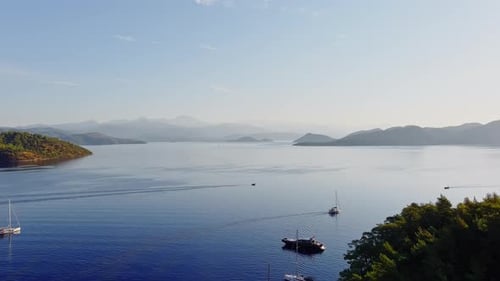 Aerial Footage of the Picturesque Bay of the Many Islands Near Marmaris at Sunrise Lone Sailing