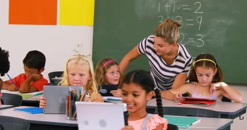 Enthusiastic Students Learning with Tablets in Classroom