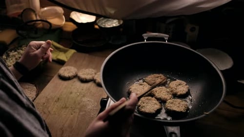 Food Cooking in Pan Indoors