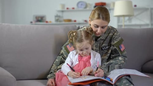 Military Mom Coloring with Daughter at Home