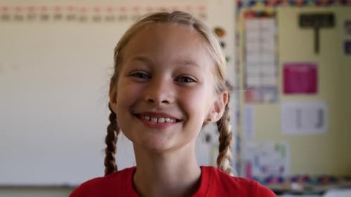Smiling Girl Portrait in Classroom