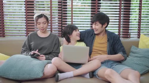 Family Relaxing Together at Home with Technology