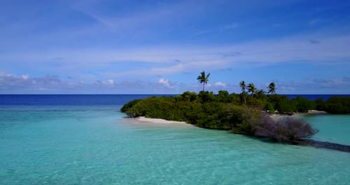 Daytime aerial travel shot of a summer white paradise sand beach and turquoise sea background in hig