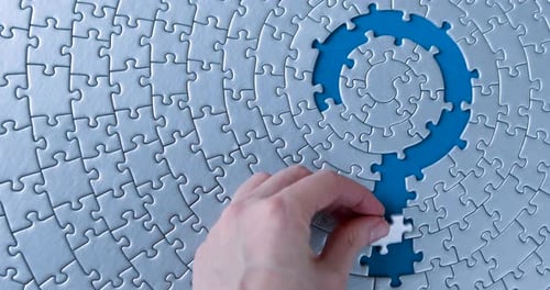 Grey Puzzles Isolated On Blue Background. Social Issue Concept