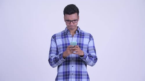 Young Adult Typing on Smartphone