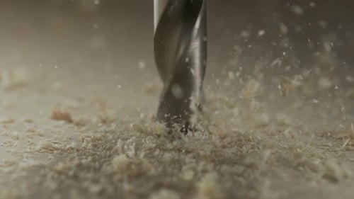 Drilling hole onto wood panel, Slow Motion