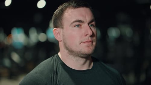 Bodybuilder Posing in Gym After Workout