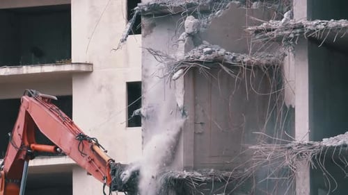 Excavator Destroys Building in Urban Area