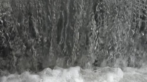 Close Up of Water Falling Down Waterfall