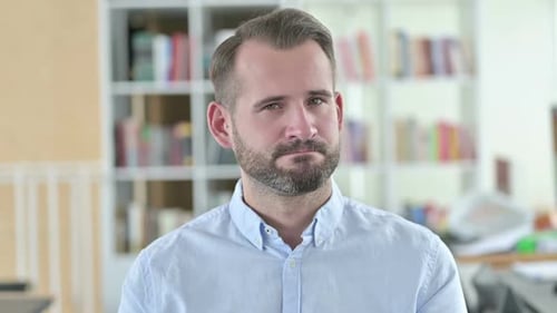 Young Adult Man Looking at the Camera