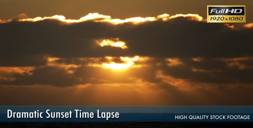 Dramatic Sunset over Ocean with Sunbeams and Clouds