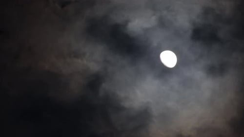 Full Moon Timelapse with Clouds in the Dark Sky