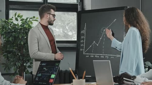 Business Presentation with Data Graph in Modern Office