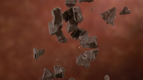 Chunks of Dark Chocolate Floating Upward