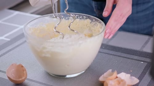 Preparing Sweet Food Dessert in Kitchen at Home Mixing Ingredients in Bowl Cooking Dough