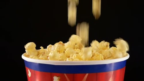 Popcorn Falling in a Bag, on Black, 2 Pack, Slow Motion