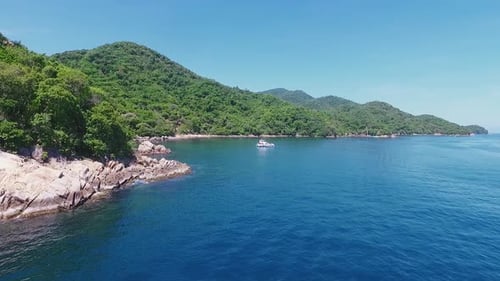 Aerial View of Tropical Coastline with Boat