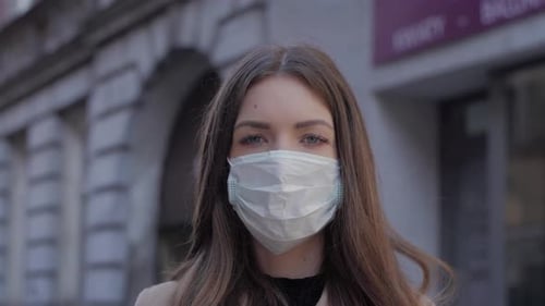 Girl Cover Her Face with Mask