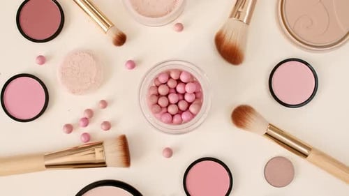 A Set of Decorative Cosmetics on Beige Background