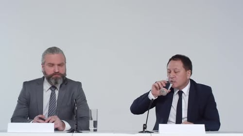 Male Multiethnic Scientists in Conference Hall