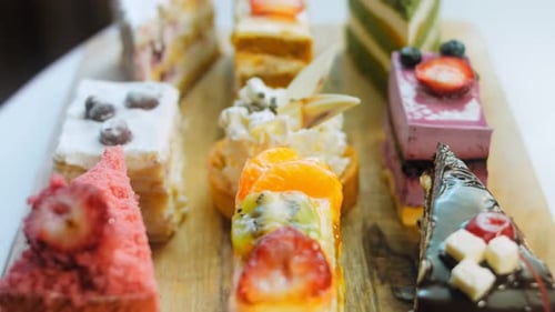 Delicious Assortment of Colorful Cakes on Display