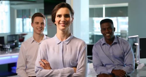 Smiling Team Poses in the Modern Office
