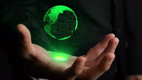 Digital Green Globe Over Hand