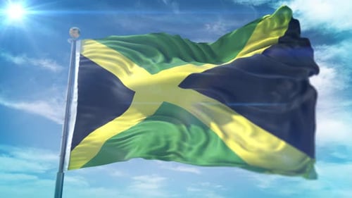 Realistic Jamaican Flag Waving in Wind Against Bright Blue Sky