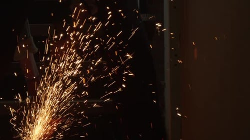 Cutting Steel with Angle Grinder in Workshop