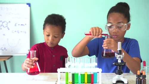 Children Conducting a Chemistry Experiment in the Lab