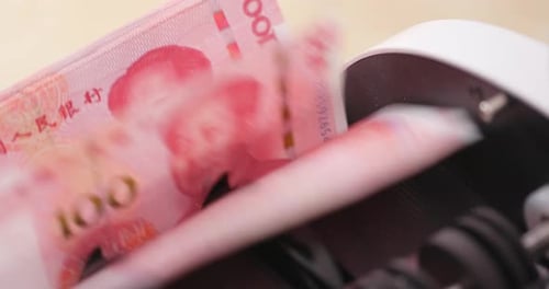 Cash Counting Machine Counts Pink Chinese Yuan Renminbi